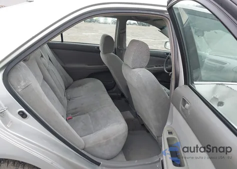 2002 Toyota Camry Le from USA, damaged, VIN 4T1BE32K02U512813